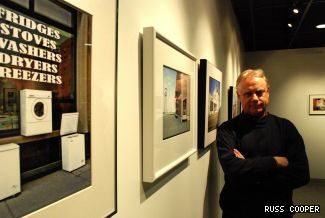 Communication studies professor Rick Hancox, who’s been at Concordia for 25 years, stands in the CJ Media Gallery beside his photos taken with a mere disposable camera. “What I liked about it was how spontaneous and simple it was; you just point it, frame it and click,” he said.